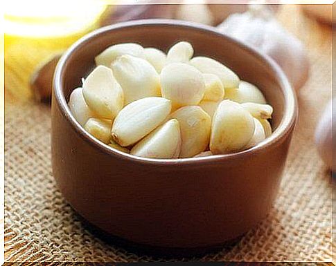 Garlic clove in a clay bowl