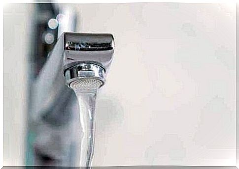 Water flowing from a tap.