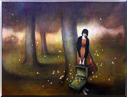 woman with suitcase full of butterflies