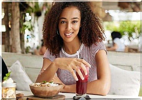 A woman eating breakfast