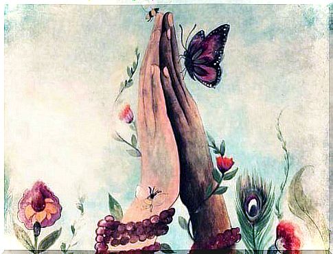 Hands with butterfly and flowers