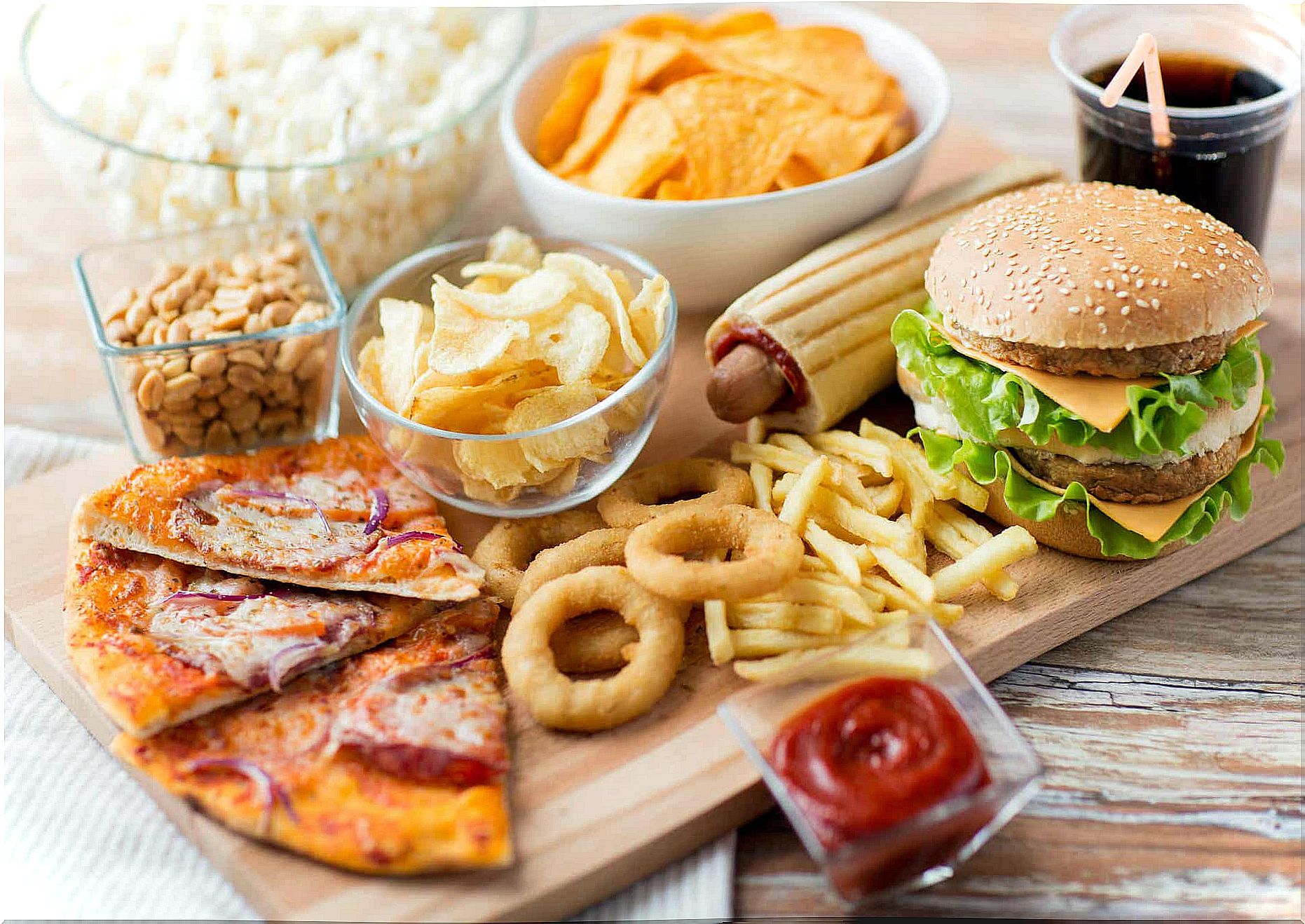 Junk food, such as pizza, chips, french fries and fast food.