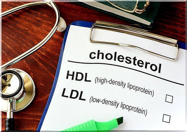 Clipboard on a doctor's table with a paper about cholesterol