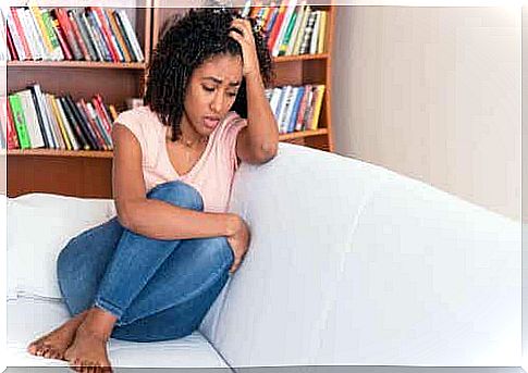 A woman sitting on a sofa