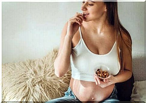 Pregnant woman eats nuts