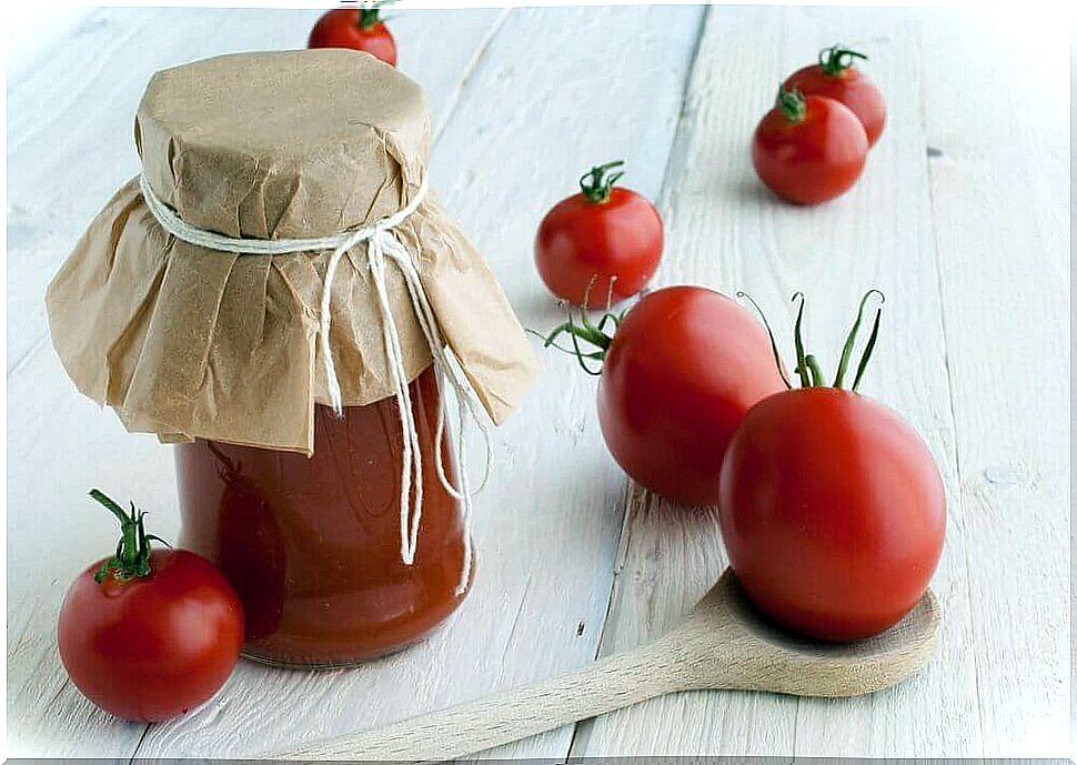 Why should you bottle tomatoes and how do you do it?