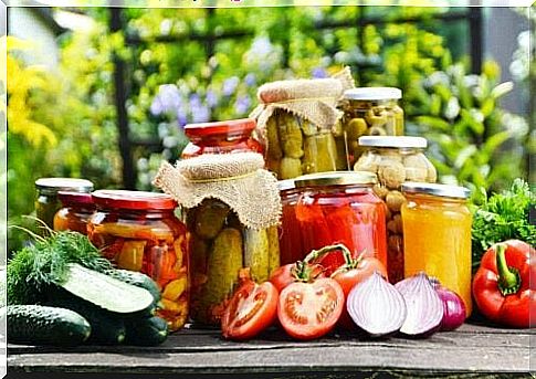 Different vegetables in glass containers